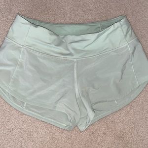 Light green Lululemon Speed-Up shorts